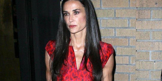 Demi Moore attends the 'Margin Call' premiere at the Landmark Sunshine Cinema on October 17, 2011 in New York City looking vacant, wearing her wedding ring and very thin. October 17, 2011. X17online.com