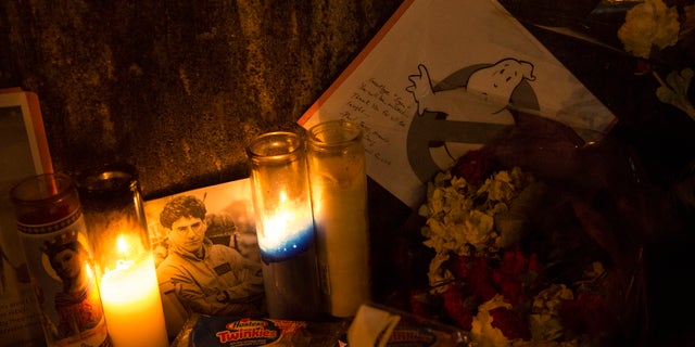 A memorial to recently deceased actor Harold Ramis is seen outside the Hook & Ladder 8 Firehouse in New York February 25, 2014. The firehouse was the main location in the film Ghostbusters and Ghostbusters 2, which Ramis co-starred in and co-wrote. REUTERS/Andrew Kelly (UNITED STATES - Tags: ENTERTAINMENT OBITUARY) - RTR3FQ2Q