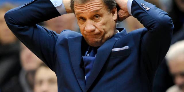 Minnesota Timberwolves head coach Flip Saunders watches during the second quarter of an NBA basketball game against the Philadelphia 76ers Wednesday, Dec. 3, 2014, in Minneapolis. (AP Photo/Hannah Foslien)