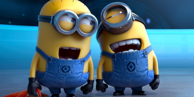 FILE - This file photo provided by Universal Pictures shows the minion characters in the film "Despicable Me 2." Domestic box office numbers so far on this long Fourth of July holiday weekend are suggesting the the animated minions of family favorite, with a price tag one third of what The Lone Ranger cost to make, is outperforming the masked man by more than three to one. (AP Photo/Universal Pictures, File)