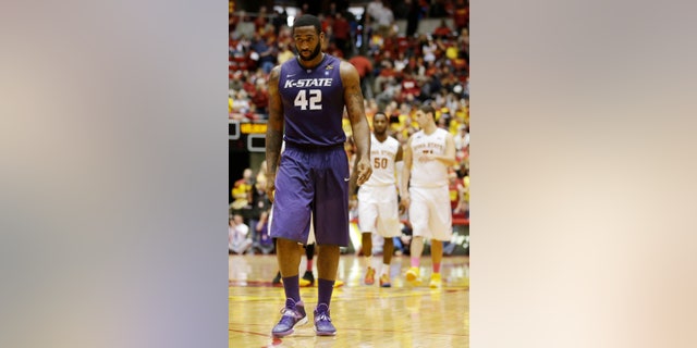 Kansas State forward Thomas Gipson (42) walks up court during the second half of an NCAA college basketball game against Iowa State, Saturday, Jan. 25, 2014, in Ames, Iowa. Iowa State won 81-75. (AP Photo/Charlie Neibergall)