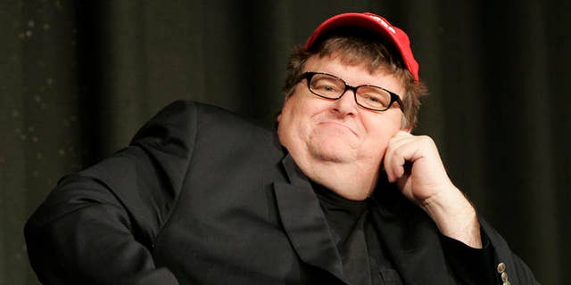 Filmmaker Michael Moore’s proposal to release crime scene photographs from Sandy Hook Elementary School would be a 'horrendous offense' to relatives of victims, Dorrie Carolan, co-president of the Newtown Parent Connection, Inc., told FoxNews.com. (AP)