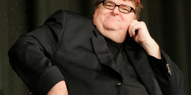Filmmaker Michael Moore’s proposal to release crime scene photographs from Sandy Hook Elementary School would be a 'horrendous offense' to relatives of victims, Dorrie Carolan, co-president of the Newtown Parent Connection, Inc., told FoxNews.com. (AP)