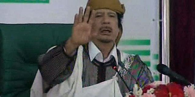 March 2: This video image taken from Libyan state television broadcast shows Libyan leader Muammar al-Qaddafi addressing supporters and journalists in Tripoli, Libya.
