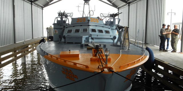 PT-305 docked in a facility built to house the boat along Lake Pontchartrain.