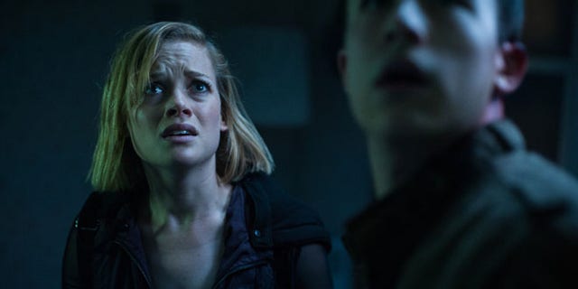 FILE - This undated file image released by Sony Pictures shows Jane Levy, left, and Dylan Minnette in a scene from "Dont Breathe." According to studio estimates Sunday, Aug. 28, 2016, audiences turned out in droves for the late summer thriller, which brought in $26.1 million. (Gordon Timpen/Sony/Screen Gems via AP, File)