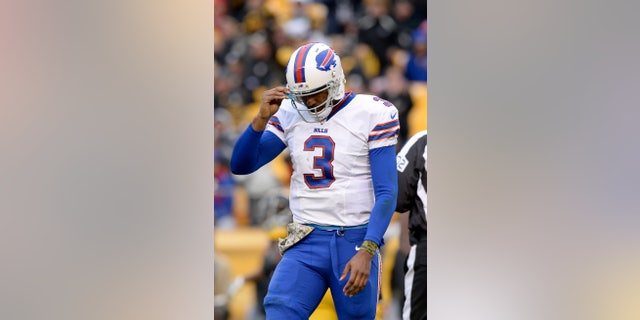 Buffalo Bills' EJ Manuel walks off the field after being tackled during the second half of an NFL football game against the Pittsburgh Steelers, Sunday, Nov. 10, 2013, in Pittsburgh. (AP Photo/Don Wright)