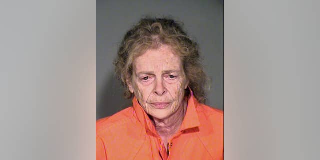 This Sunday, July 17, 2016, photo provided by the Simi Valley, Calif., Police Department shows Mary Karacas, 75. Karacas was arrested for investigation of murder after her 83-year-old boyfriend was found dead in their home Simi Valley home Sunday. The body of Salvatore Orefice was discovered in a bed Sunday by a man who had bought the house in Simi Valley from the couple in June, and stopped by to check their progress with moving out. (Simi Valley Police Department via AP)