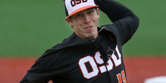 FILE: , Oregon State pitcher Luke Heimlich throws during an NCAA college baseball game against UC Davis in Corvallis, Ore.