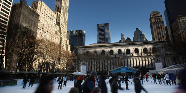 NEW YORK - JANUARY 03: Ice skaters skate on the rink at Bryant Park January 3, 2008 in New York City. While much of the East Coast is experiencing freezing temperatures, significantly warmer weather is forecast for the weekend. (Photo by Spencer Platt/Getty Images)