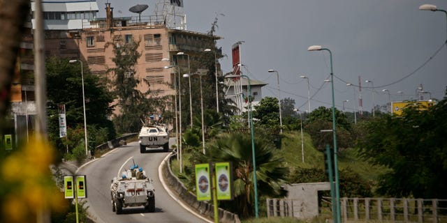 March 31: U.N. troops patrol in armored personnel carriers the streets in the city of Abidjan, Ivory Coast. Fighters trying to install Ivory Coast's democratically elected president began besieging the main city of Abidjan on Thursday as the top army commander fled his post in the face of a lightning offensive that saw several towns and a seaport quickly fall. (AP)