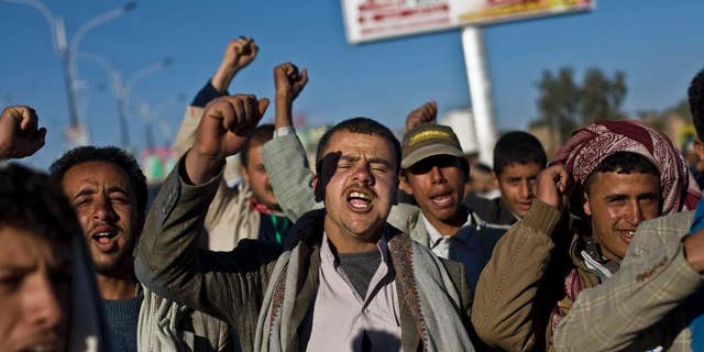 Houthi Shiite Yemenis chant slogans during a rally to show support for their comrades, in Sanaa, Yemen, Wednesday, Jan. 28, 2015. (AP Photo/Hani Mohammed)