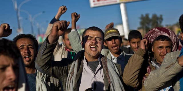 Houthi Shiite Yemenis chant slogans during a rally to show support for their comrades, in Sanaa, Yemen, Wednesday, Jan. 28, 2015. (AP Photo/Hani Mohammed)