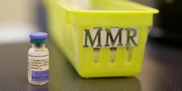 FILE- This Feb. 6, 2015, file photo shows a measles vaccine on a countertop at the Tamalpais Pediatrics clinic in Greenbrae, Calif. The Australian government has ramped up pressure on parents who oppose vaccination by threatening to withhold child care and other payments from families that fail to immunize their children. (AP Photo/Eric Risberg, File)