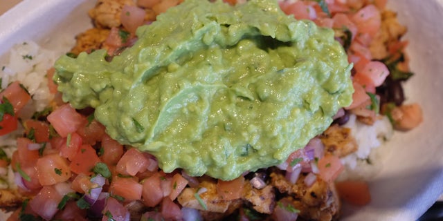 MIAMI, FL - MARCH 05: Guacamole sits on a dish at a Chipotle restaurant on March 5, 2014 in Miami, Florida. The Mexican fast food chain is reported to have tossed around the idea that it would temporarily suspend sales of guacamole due to an increase in food costs. (Photo by Joe Raedle/Getty Images)