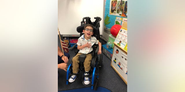 Jake can now recite the pledge "on cue," his father said.