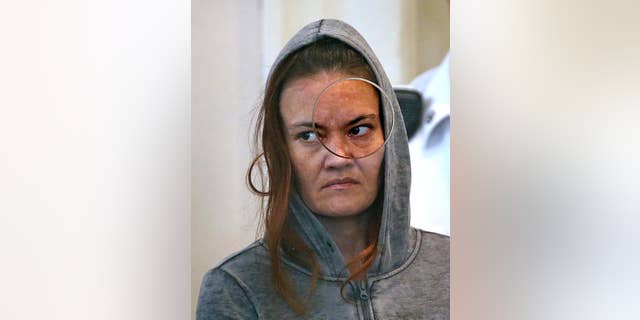 Rachelle Bond is arraigned in Dorchester District Court in Boston in 2015.