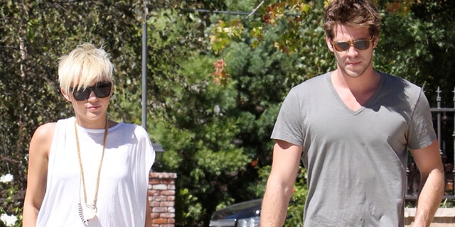 Miley Cyrus and Liam Hemsworth visit a friend in Pasadena. Sunday, September 2, 2012.