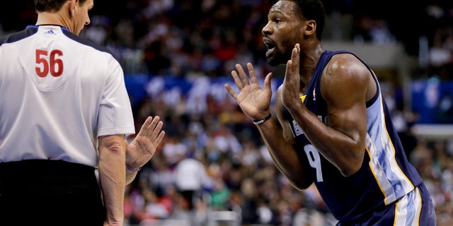 Memphis Grizzlies shooting guard Tony Allen, right, reacts after getting called for a foul by referee Mark Ayotte during the first half of an NBA basketball game in Los Angeles, Monday, Nov. 18, 2013. (AP Photo/Chris Carlson)
