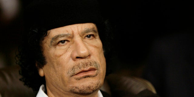 Libyan leader Moammar al-Qaddafi is seen in Damascus, Syria, in 2008. He was assassinated in 2011. (Associated Press)