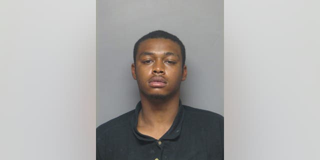 This image provided by the Delaware Department of Justice shows Keith Price. An officer fatally shot a Delaware man wanted on an attempted murder charge after the suspect pointed a gun at the officer during a foot chase, police said Thursday, April 20, 2017. New Castle County Police identified Price as the man killed in the shooting outside a church a day earlier. (Delaware Department of Justice via AP)