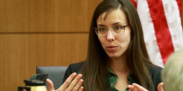 Feb. 6, 2013: Defendant Jodi Arias describes her relationship with Travis Alexander and answers questions from her attorney Kirk Nurmi as she testifies in her murder trial in Judge Sherry Stephens' Superior Court.  Arias, 32, is accused of stabbing and slashing Alexander, 27 times, slitting his throat and shooting him in the head in his suburban Phoenix home in June 2008. She initially denied any involvement, then later blamed it on masked intruders before eventually settling on self-defense. (AP)