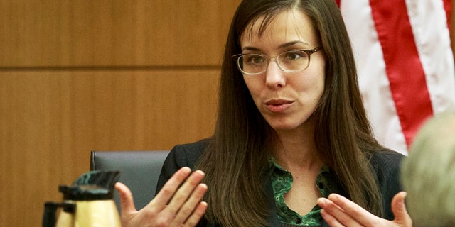 Feb. 6, 2013: Defendant Jodi Arias describes her relationship with Travis Alexander and answers questions from her attorney Kirk Nurmi as she testifies in her murder trial in Judge Sherry Stephens' Superior Court. Arias, 32, is accused of stabbing and slashing Alexander, 27 times, slitting his throat and shooting him in the head in his suburban Phoenix home in June 2008. She initially denied any involvement, then later blamed it on masked intruders before eventually settling on self-defense. (AP)