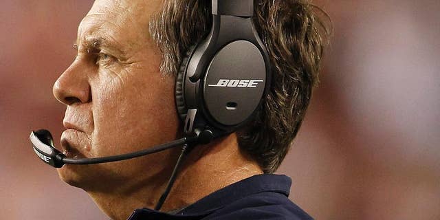 New England Patriots coach Bill Belichick during the second half of teh Patriots' NFL football preseason game against the Washington Redskins in Landover, Md., Thursday, Aug. 7, 2014. (AP Photo/Connor Radnovich)