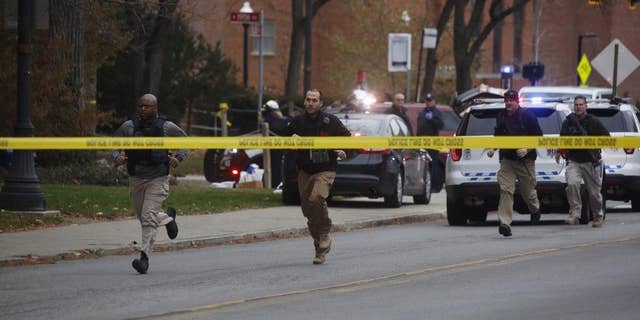 Police respond to reports of an active shooter on campus at Ohio State University on Monday, Nov. 28, 2016, in Columbus, Ohio. (Tom Dodge/The Columbus Dispatch via AP)