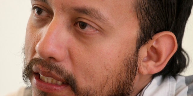 In this June 26, 2015 photo, Mexican photojournalist Ruben Espinosa speaks during an interview in Mexico City. Espinosa had recently gone into self-exile from the Gulf coast state of Veracruz, where he felt under threat, according to Proceso magazine. His family had lost contact with him on Friday and by Saturday the free speech advocacy group Article 19 had called on Mexican authorities to activate the protocols for locating a missing journalist. Espinosa was found slain, along with four other people early Saturday in an apartment in Mexico City, according to the magazine. (AP Photo/Luis Barron)