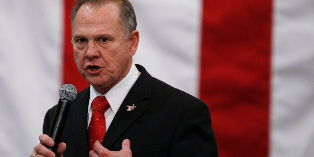 FILE- In this Dec. 11, 2017, file photo, U.S. Senate candidate Roy Moore speaks at a campaign rally in Midland City, Ala. Moore is telling supporters âthe battle is not overâ in Alabamaâs Senate race as he asks for campaign donations and any reports of voting irregularities. Moore in a Friday, Dec. 15, fundraising email asked supporters to contribute to his âelection integrity fundâ and tell them of any problems at the polls. (AP Photo/Brynn Anderson, File)