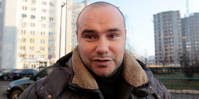 Volodymyr Maralov, 27, an activist with Road Control, speaks during an interview with the Associated Press in Kiev, Ukraine, Tuesday, Dec. 24, 2013. Last week, Maralov was dragged out of his car and shot point-blank in the chest with a rubber bullet that almost hit his heart. The attack followed the jailing of two other group members and the beating of another; one other member had fled the country. Road Control’s hundreds of members monitor abuses by the traffic police. The force’s alleged widespread corruption is one of many issues angering anti-government protesters who have gathered in central Kiev for massive demonstrations for more than a month. (AP Photo/Sergei Chuzavkov)