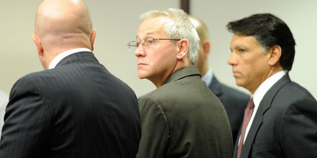Oscar Ray Bolin Jr. watches as the jurors walk into the courtroom on April 19, 2012, in Tampa.