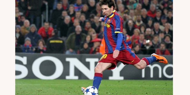 FC Barcelona's Lionel Messi, of Argentina, prepares to kick the penalty during a Champions League, round of 16, second leg soccer match against Arsenal at the Nou Camp, in Barcelona, Spain, Tuesday, March 8, 2011. (AP Photo/Felice Calabro')