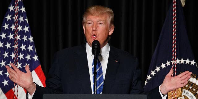 In this Feb. 8, 2017, photo, President Donald Trump speaks to the Major County Sheriffs' Association and Major Cities Chiefs Association, in Washington.Trump says it doesn’t take a lawyer to see that his order banning visitors from seven Muslim-majority nations is a “common sense” move to protect the U.S. from terrorists. He says even a bad high school student could figure that out. (AP Photo/Evan Vucci)