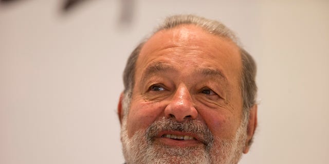 FILE - In this Jan. 14, 2013 file photo, Mexican telecommunications tycoon Carlos Slim speaks during news conference at the Soumaya museum in Mexico City. Slim recently bought part of two of Mexico's first division soccer teams, setting up another showdown with television giants Televisa and TV Azteca, major players in the soccer field that are in turn trying to push their way into Slim’s telecommunications and Internet markets. (AP Photo/Dario Lopez-Mills, File)