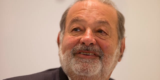 FILE - In this Jan. 14, 2013 file photo, Mexican telecommunications tycoon Carlos Slim speaks during news conference at the Soumaya museum in Mexico City. Slim recently bought part of two of Mexico's first division soccer teams, setting up another showdown with television giants Televisa and TV Azteca, major players in the soccer field that are in turn trying to push their way into Slim’s telecommunications and Internet markets. (AP Photo/Dario Lopez-Mills, File)
