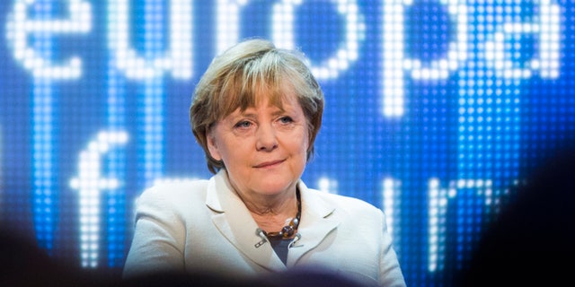 German Chancellor Angela Merkel attends a discussion panel on "making Europe strong" during the Europe forum conference, organized by German public-broadcaster WDR, in Berlin, Germany, Thursday, May 16, 2013. (AP Photo/Gero Breloer)