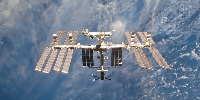 The Russian Soyuz MS-09 crew craft (left) and the Northrop Grumman (formerly Orbital ATK) Cygnus space freighter are attached to the International Space Station. REUTERS/NASA/Handout