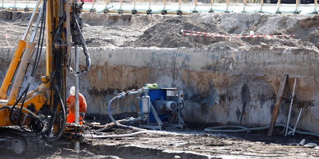 Warning tape is pictured at a construction site at Heidestrasse street near the capital's central train station, after a World War II bomb was discovered at the site in Berlin.