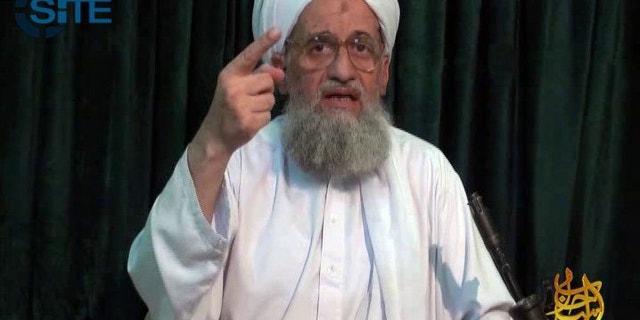 FILE -- In this undated file frame grab from video provided by IntelCenter, an American private terrorist threat analysis company, shows Al-Qaida's leader Ayman Al-Zawahri in a still image from a web posting by al-Qaida's media arm, as-Sahab, Wednesday July 27, 2011. Al-Qaida's leader has urged Muslims in Arab Spring countries to unite to institute an Islamic state, while warning France that its intervention in Mali will be bogged down, in a 103-minute audio message posted on militant websites late Saturday, April 6, 2013. In the recording, al-Zawahri urged Muslims to liberate their lands, apply Islamic law, halt the plundering of Muslim wealth, support rebellious Muslims and oppressed people worldwide, and establish the Islamic Caliphate, or religious state. (AP Photo/IntelCenter, File) THE ASSOCIATED PRESS HAS NO WAY OF INDEPENDENTLY VERIFYING THE CONTENT, LOCATION OR DATE OF THIS PICTURE. NO SALES MANDATORY CREDIT, INTELCENTER