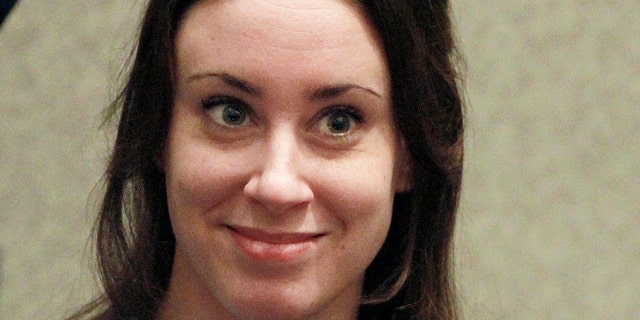 July 7, 2011: Casey Anthony smiles before the start of her sentencing hearing in Orlando, Fla.