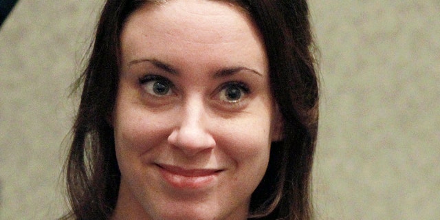 July 7, 2011: Casey Anthony smiles before the start of her sentencing hearing in Orlando, Fla.