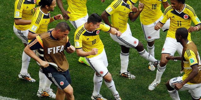 James Rodriguez dari Kolombia, seorang ayah yang bangga dan pria yang paling ditakuti Brasil di Piala Dunia