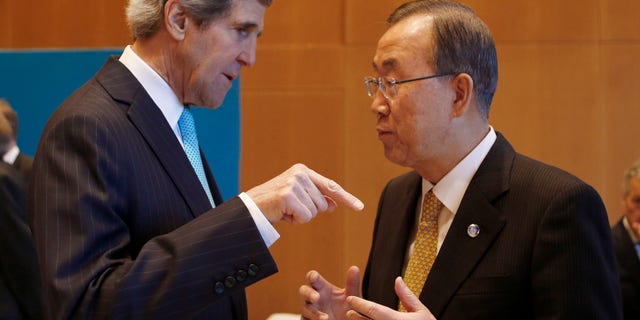 U.S. Secretary of State John Kerry, left, talks to U.N. Secretary-General Ban Ki-moon prior to the Syrian peace talks in Montreux, Switzerland, Wednesday, Jan. 22, 2014. Ban made a rare effort at solo diplomacy this week when he invited Iran to join this week’s Syria peace talks, but it backfired, raising questions about the effectiveness of a U.N. secretary-general better known _ and often criticized _ for his reserved and scripted style. (AP Photo/Arnd Wiegmann, Pool)