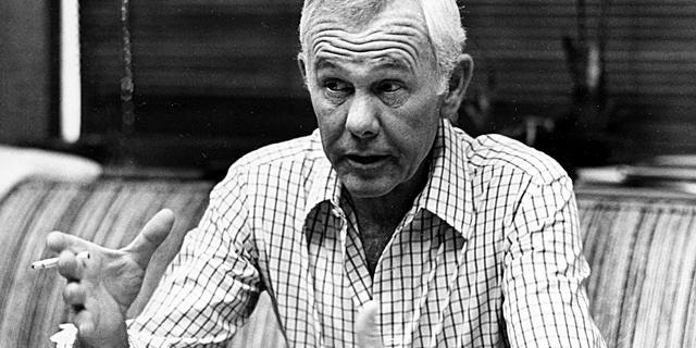 Johnny Carson, host of the "Tonight Show," talks in his office in Los Angeles, Ca., Sept. 14, 1982. The late-night talk show celebrates its 20th year on television. (AP Photo/Nick Ut)