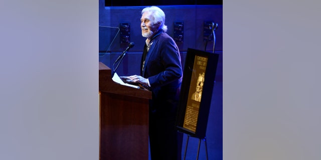 Country music star Kenny Rogers gives his acceptance speech at the ceremony for the 2013 inductions into the Country Music Hall of Fame on Sunday, Oct. 27, 2013.