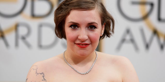 January 12, 2104. Lena Dunham arrives at the 71st annual Golden Globe Awards in Beverly Hills, California.