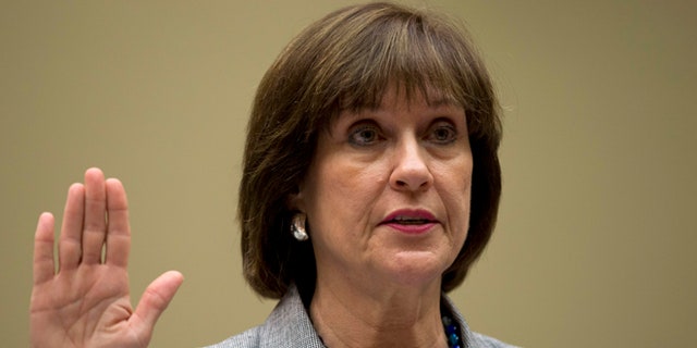 File: May 22, 2013: Ex-IRS official Lois Lerner is sworn in on Capitol Hill, in Washington, D.C.
