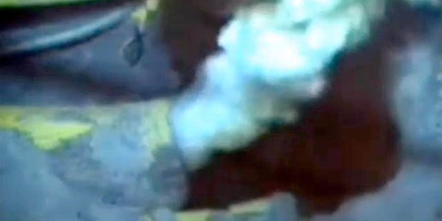 An image from a video of a jagged pipe leaking millions of gallons of oil into the Gulf of Mexico, recorded by a BP camera a mile below the water's surface.